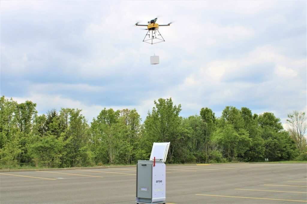 A drone is flying over a parking lot, capturing footage for an AI News report.