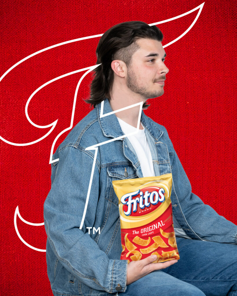 Picture showing Man with mullet cut and Fritos